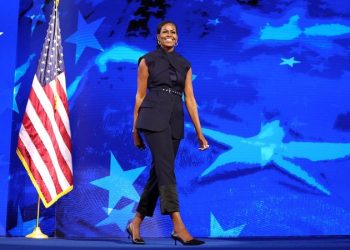 Michelle Obama wore nearly $3K pantsuit to DNC while touting her parents were ‘suspicious’ of the wealthy