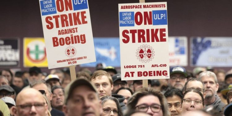 Boeing machinists reject new labor contract, extending strike